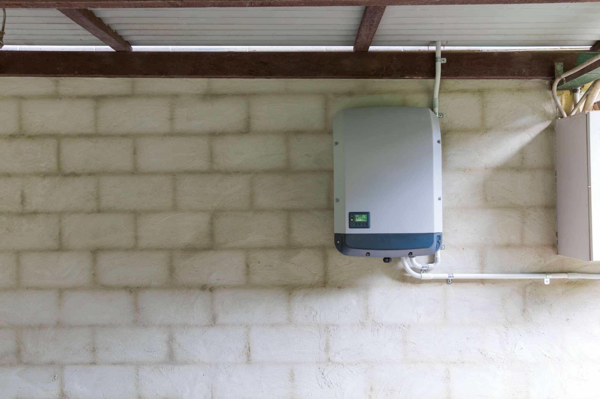solar power inverter installed in a garage