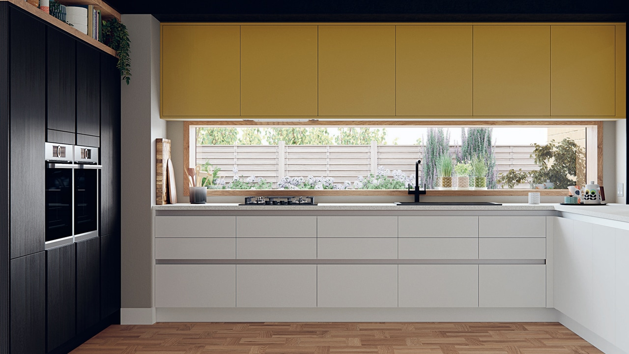The John Lewis Modena kitchen with dark and white kitchen cabinets.