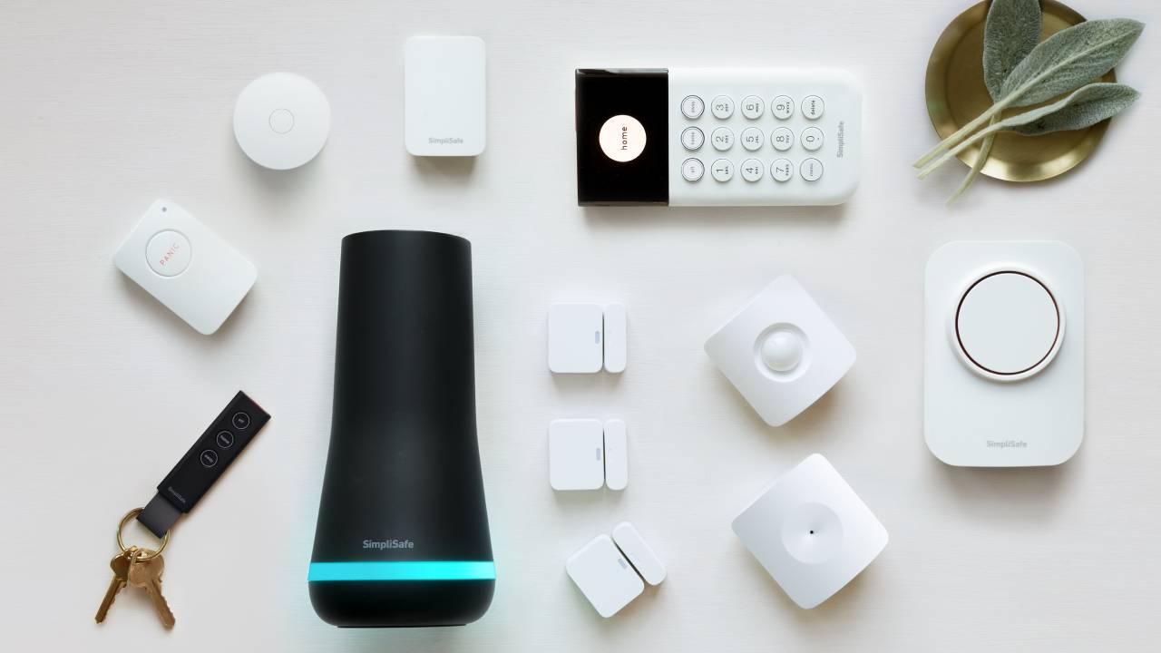 Simplisafe home security system components on white background